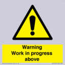 gender-neutral-construction-warning-sign-warning-work-in-progress-above-with-exc~